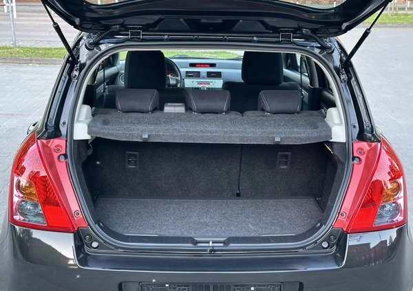 Suzuki Swift cena 16900 przebieg: 121000, rok produkcji 2009 z Gniezno małe 497